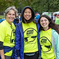 three women at an Optimism walk