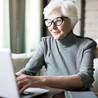 older women on a laptop